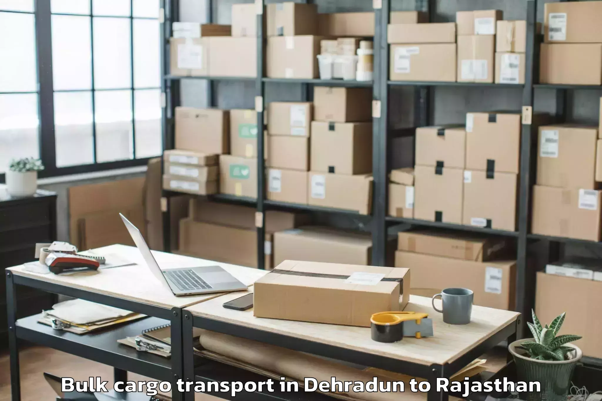 Book Dehradun to Chhoti Sadri Bulk Cargo Transport